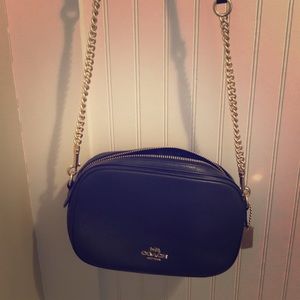 Navy blue Coach with gold hardware